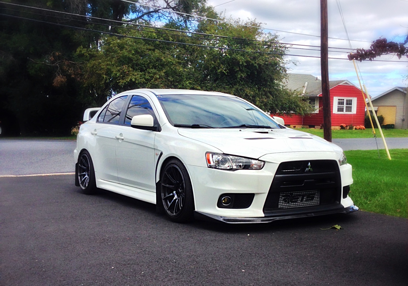 Evo white. Mitsubishi Lancer Evolution 2014. Mitsubishi Evolution x 2014. Митсубиси ланцер Эволюшн 10 белая. Mitsubishi Lancer x 2014.